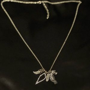 Torrid skull feather crystal charm necklace